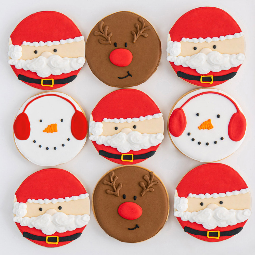 http://www.sweetesbakeshop.com/cdn/shop/files/HERO-_Christmas-Character-Cookies.jpg?v=1692214472