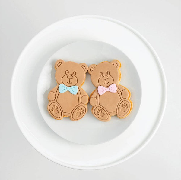 https://www.sweetesbakeshop.com/cdn/shop/products/HERO_TeddyBearcookies_6df1ed97-994a-4325-9eb1-49ab50683524_grande.jpg?v=1681503693